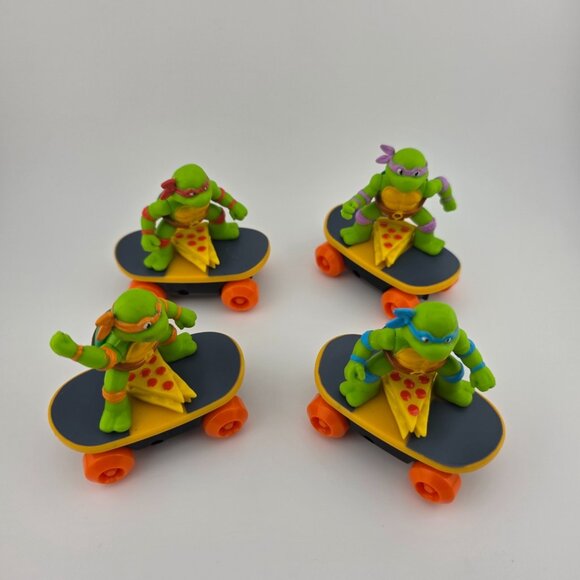 Teenage Mutant Ninja Turtles Other - 2023 Teenage Mutant Ninja Turtles Pizza Slice Skateboarding Toys - Lot of 4